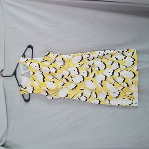 Yellow and white floral dress with cutout back